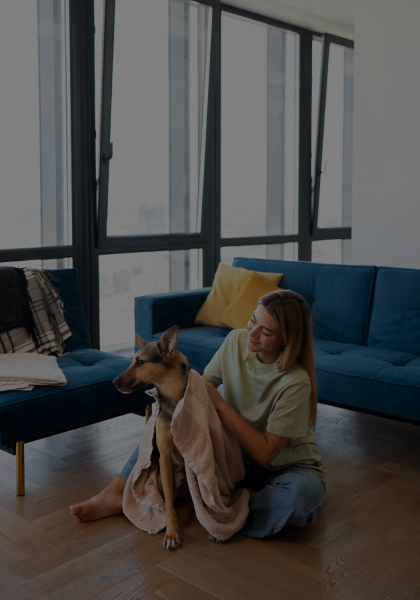 full-shot-woman-cute-dog-indoors